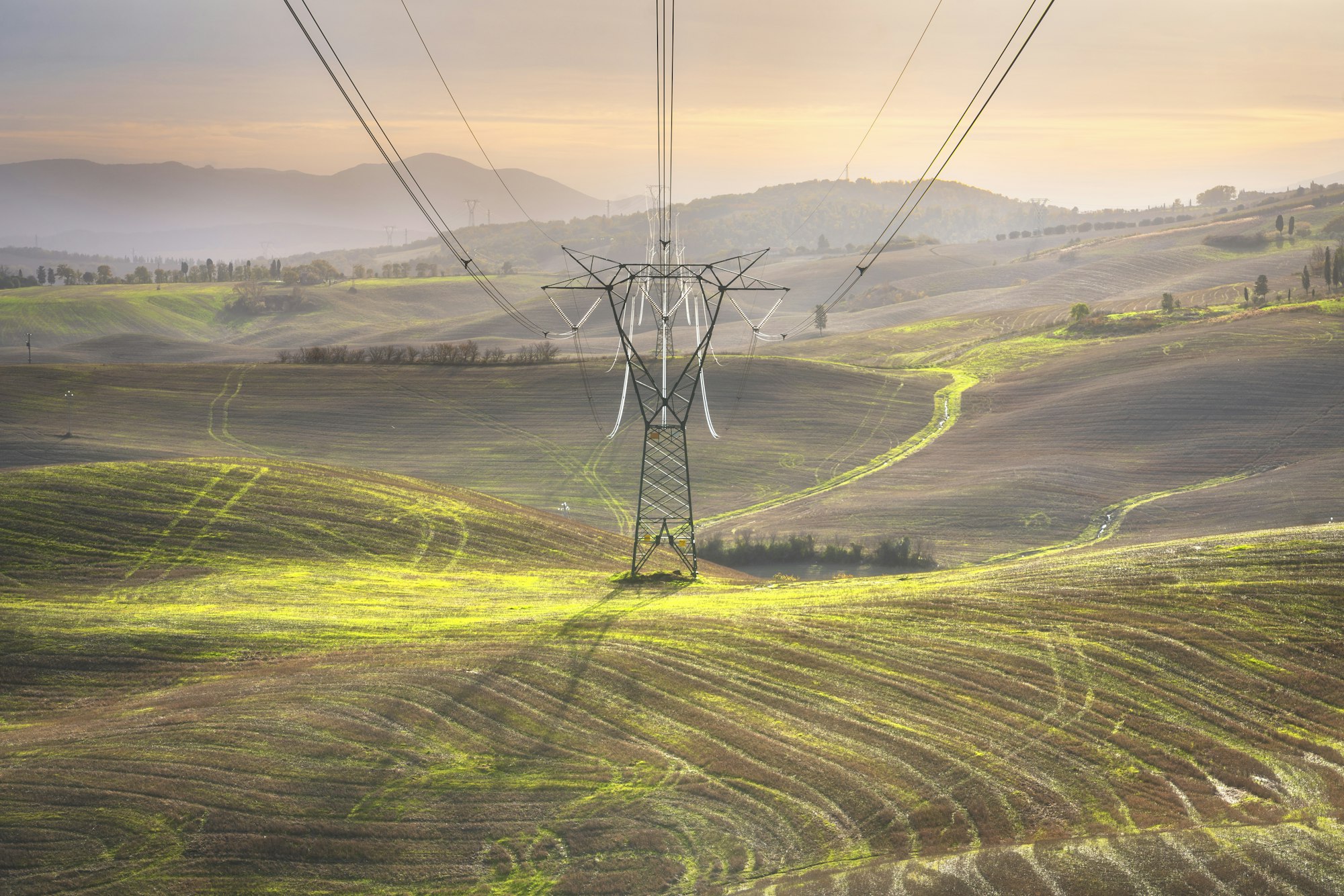 Electrical transmission tower in the Tuscany landscape.